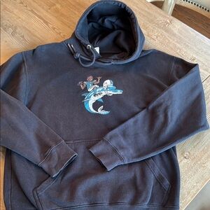 Miami Dolphins navy hoodie featuring Tua Tagovailoa
￼